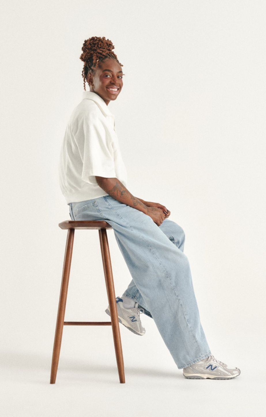 Person wearing new balance 204l sneaker